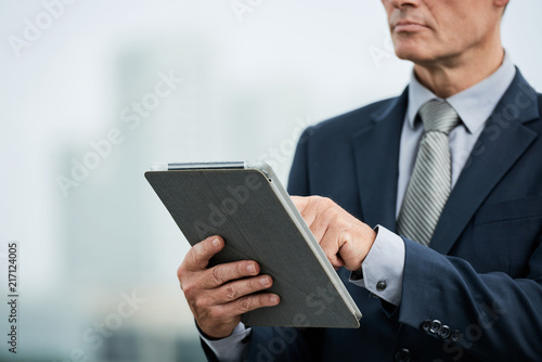Entreprneur with digital tablet