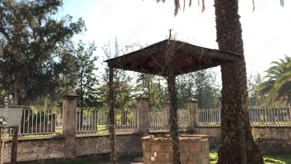 Water well in the yard of the abandoned nun's house Water well in the yard of the abandoned nun's house