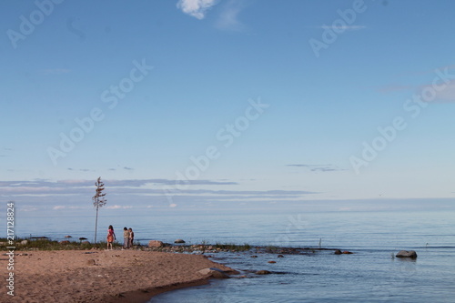 children on the shore