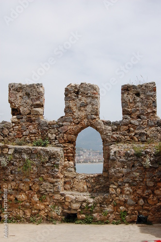 view from the loophole of the fortress of Alanya to the port and the sea