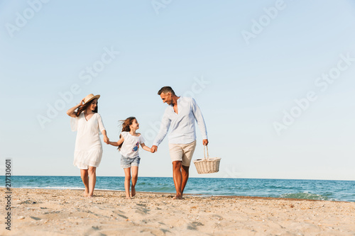 Happy family having fun together at the beach.