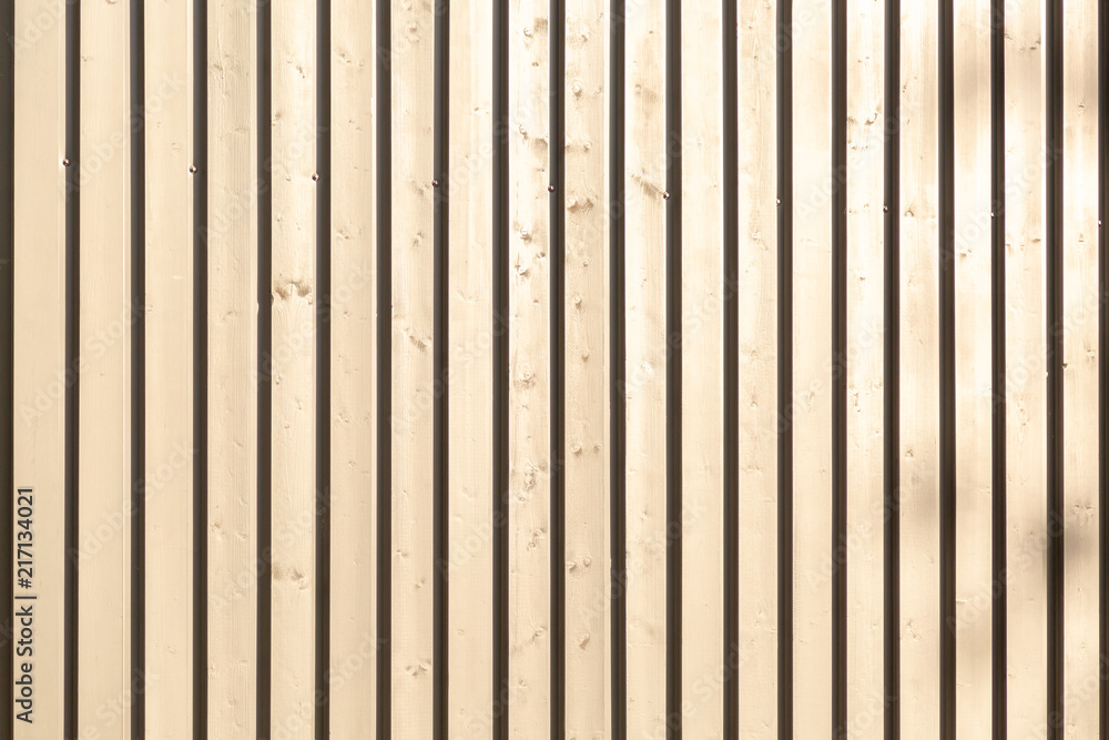 Naklejka premium Background of wooden narrow vertical bars