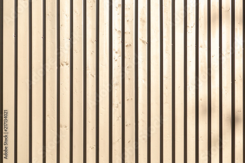 Background of wooden narrow vertical bars