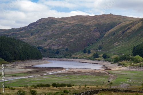 Low Water level at Haweswater reservoir reveals the remains of the village of Mardlae Green in summer 2018