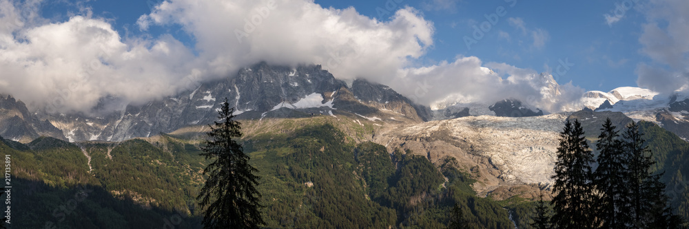 a panoramic view of the aguille du mid and mont blanc overlooking chamonix during summer in the french alpws