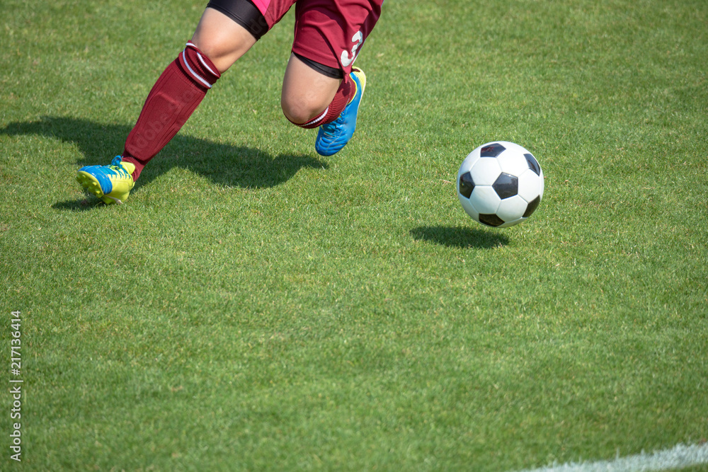 女子サッカー試合風景