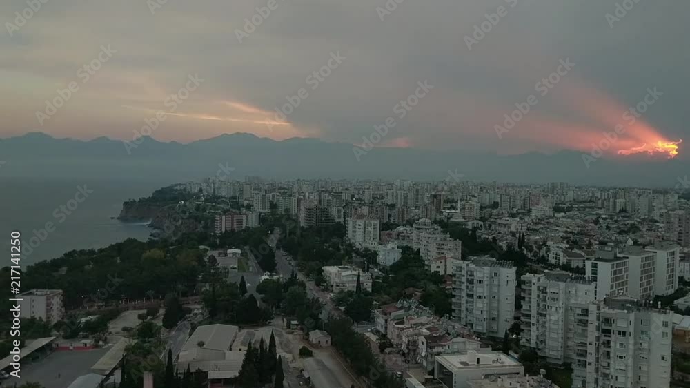view from the skyscraper to the landing airplane on the sunset in Antalya view from the skyscraper to the landing airplane on the sunset in Antalya