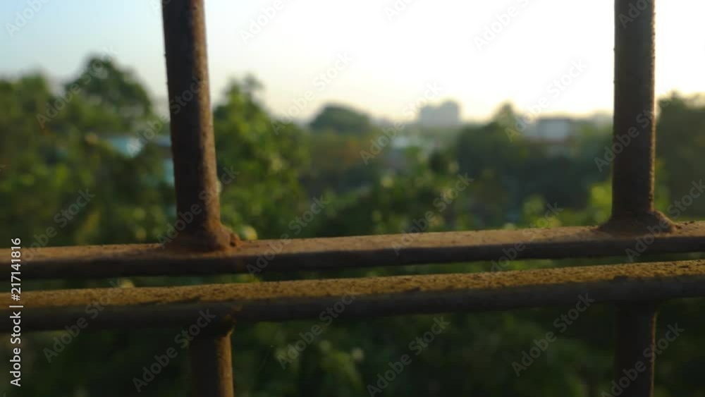 Close up slider shot (right to left) of metal bars on roof top in Sylhet, Bangladesh Close up slider shot (right to left) of metal bars on roof top in Sylhet, Bangladesh