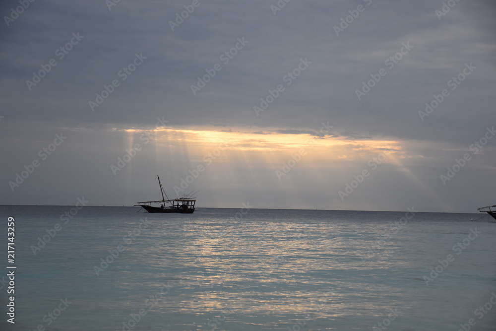 sansibar nungwi boat highlighted by sky sansibar nungwi boat highlighted by sky