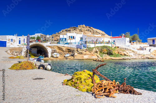 Beautiful small village at Kalafati beach with octopus drying in the sun, Mykonos island, Greece. photo