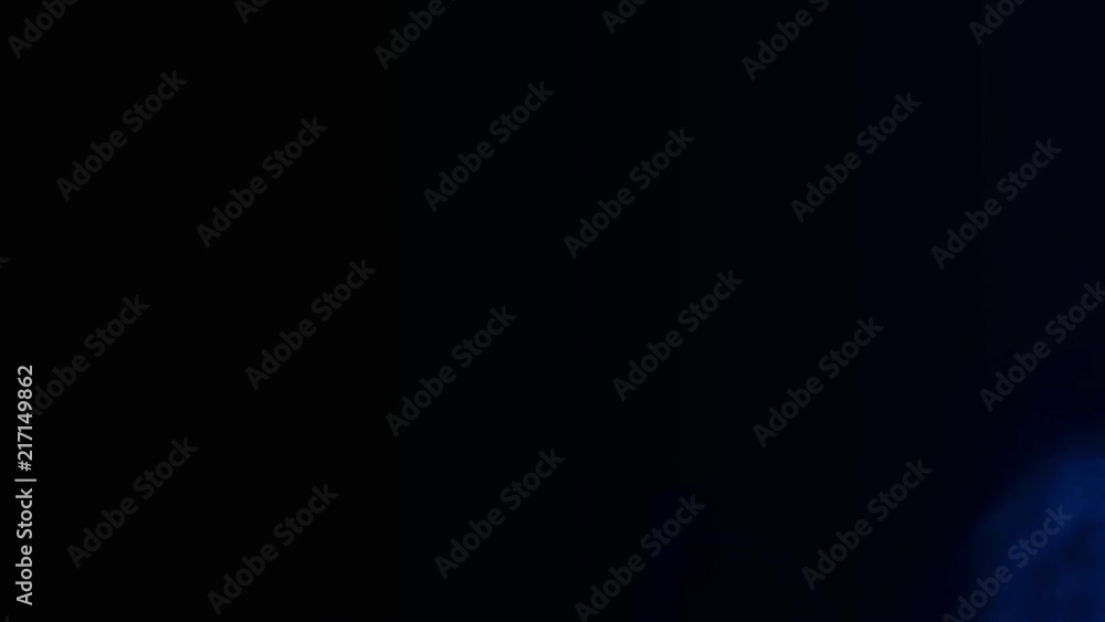 Abstract blue dust and smoke in slow-motion Abstract blue dust and smoke in slow-motion