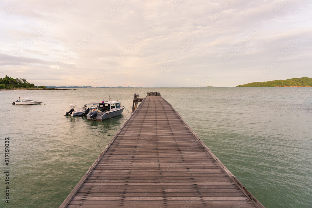 Fototapeta premium The wooden bridge in the sea