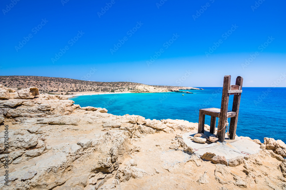 The tropical beach of Tripiti at the southern point of Gavdos island and Europe too, with the famous giant wooden chair, Greece.