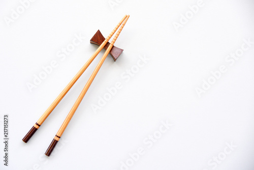 wood Chopsticks on White background Copy space.