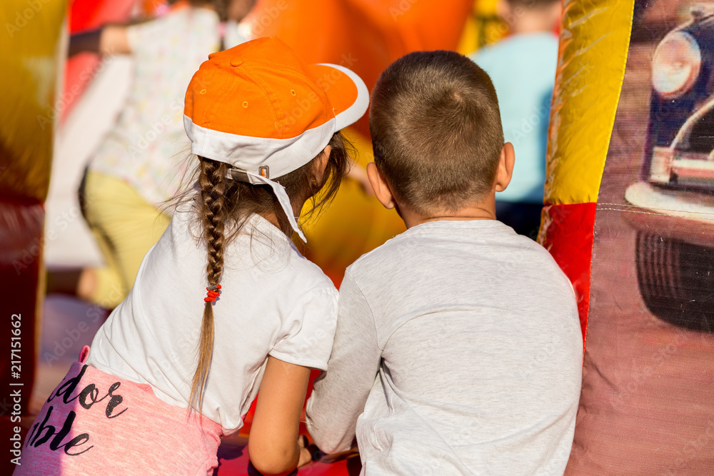 young children wishing joy together, siblings