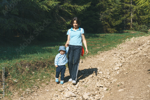 Walking Mother Holding Son's Hand