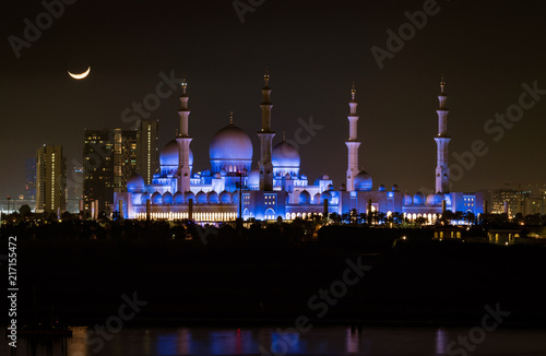 Vászonkép Sheik Zayed Mosque as seen at night with moon