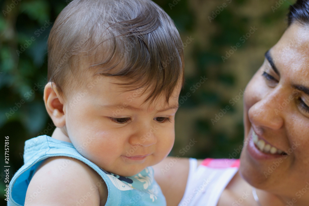 baby boy head portrait with mom in the garden baby boy head portrait with mom in the garden