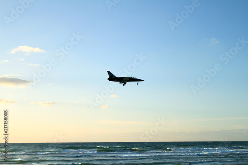 Aircraft on the sky background