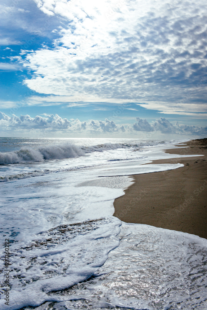 Silvery waves on a deserted beach Silvery waves on a deserted beach