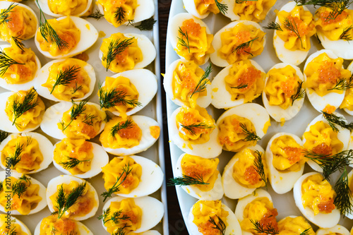 Devilled eggs with trout roe photo