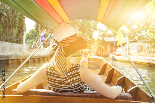 Photography woman visiting the Floating Market