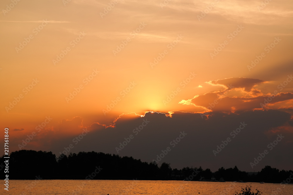 beautiful sunset after wonderful summerday at the lakeside