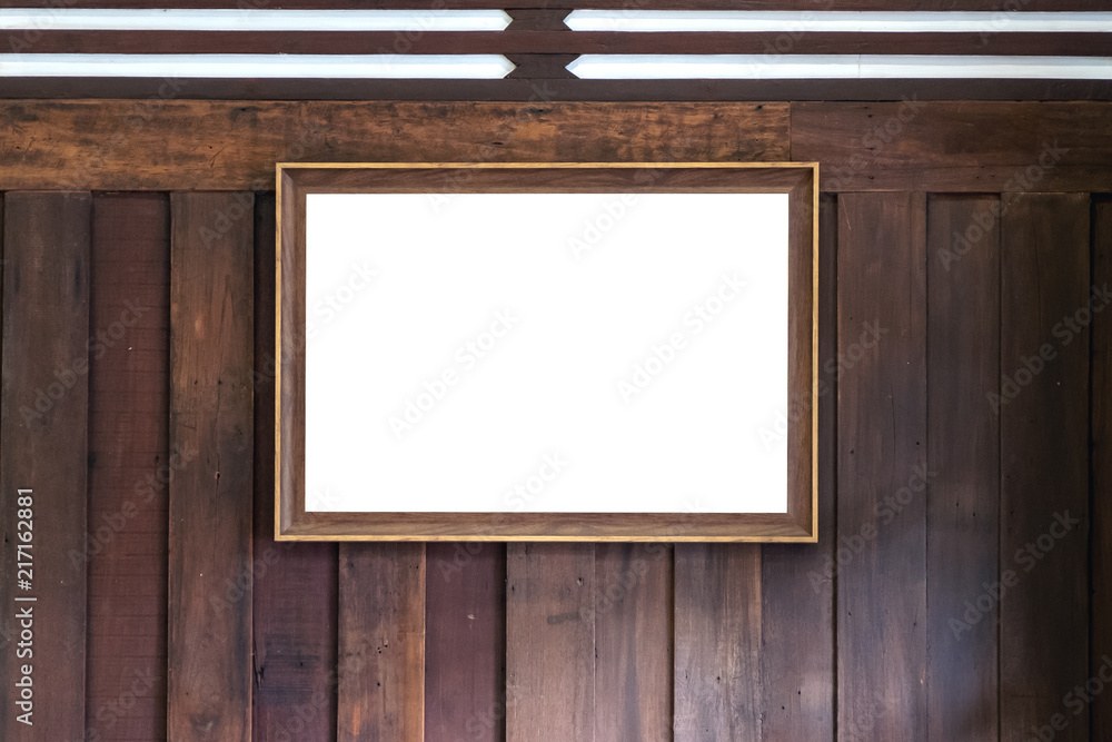 Mockup image of an antique golden picture frame with blank white screen on wooden wall background Mockup image of an antique golden picture frame with blank white screen on wooden wall background