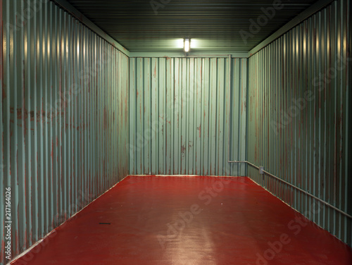 Interior of metal shipping container photo