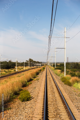 Straight Railroad Tracks in Rural Area