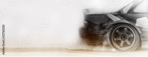 Panorama side view car drifting on track with grain, Sport car wheel drifting and smoking on track.