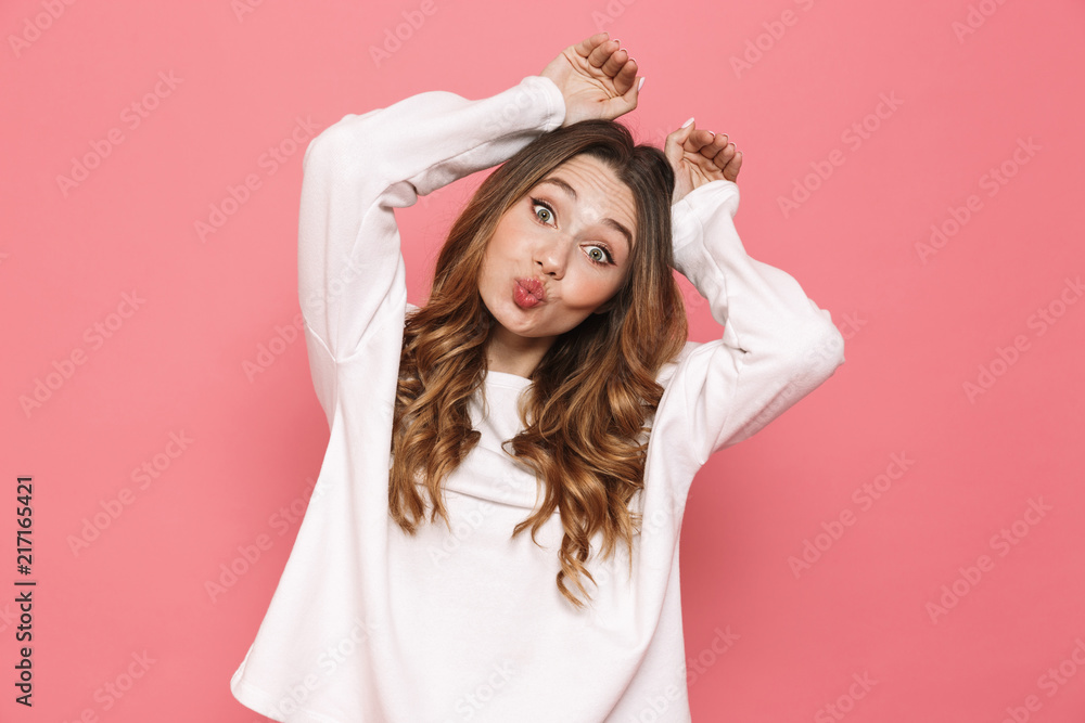 Portrait of a lovely young casual girl showing Portrait of a lovely young casual girl showing