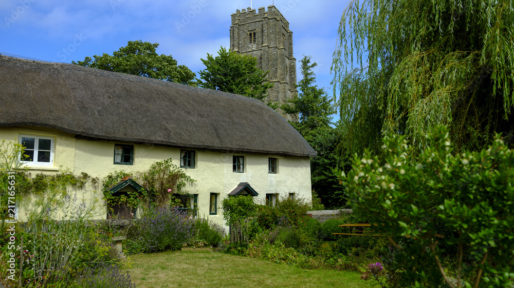 St George's Church and Village Cottages in the village of Georgham near Croyde on the North Devon coast AONB, Devon, UK