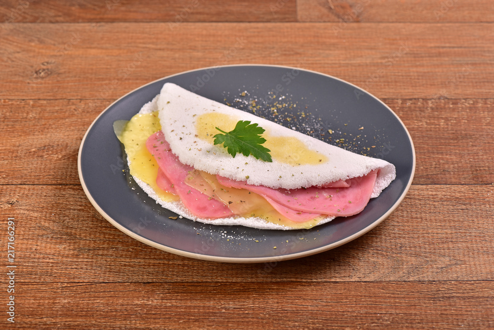 Tapioca filled with cheese and ham slices Tapioca filled with cheese and ham slices
