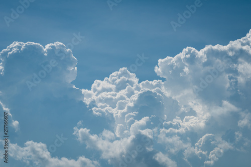 Closeup white cumulus cloud with blue sky for nature background photo