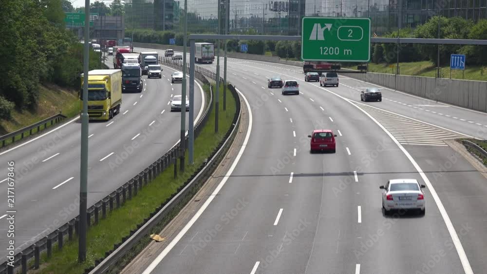 Cars drive up and down the highway - top view Cars drive up and down the highway - top view