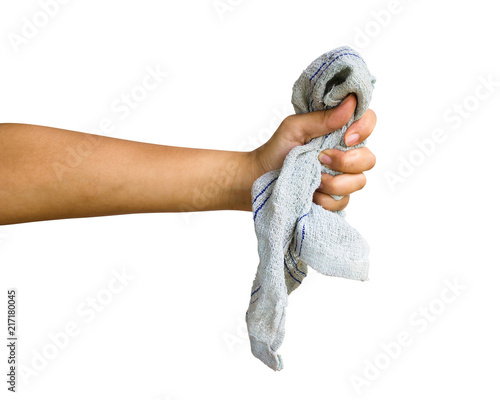Bilde på lerret Cropped hand of person holding rag or table wipes against white background included clipping path