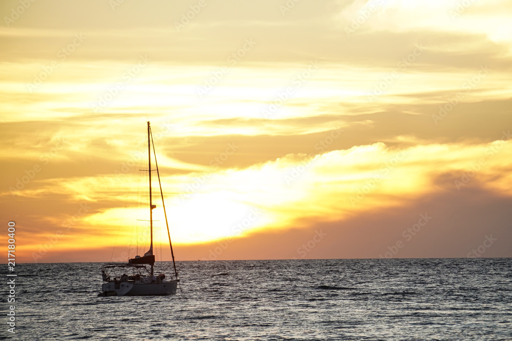 koh kood beach thailand, sunset boat orange sky people on boat, kayaking silhouette