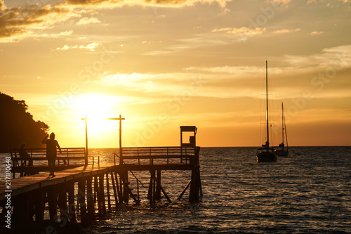 island beach sunset pier thailand people couple silhouette