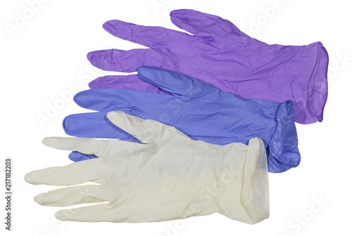 Colored medical latex gloves on white background