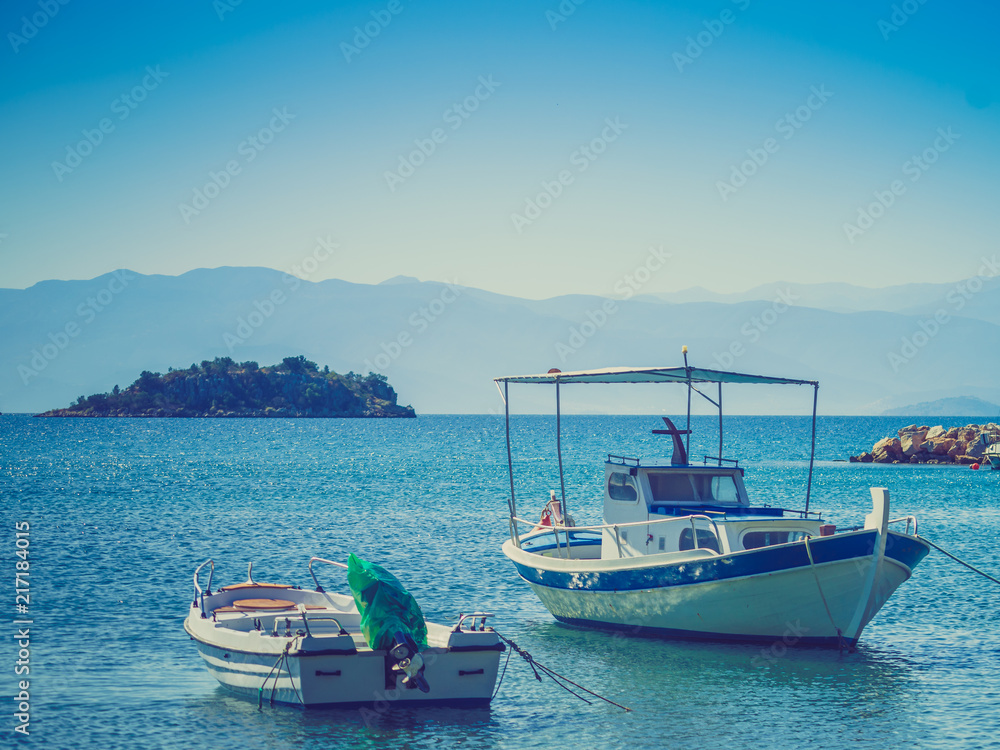 Naklejka premium Small boats on sea water