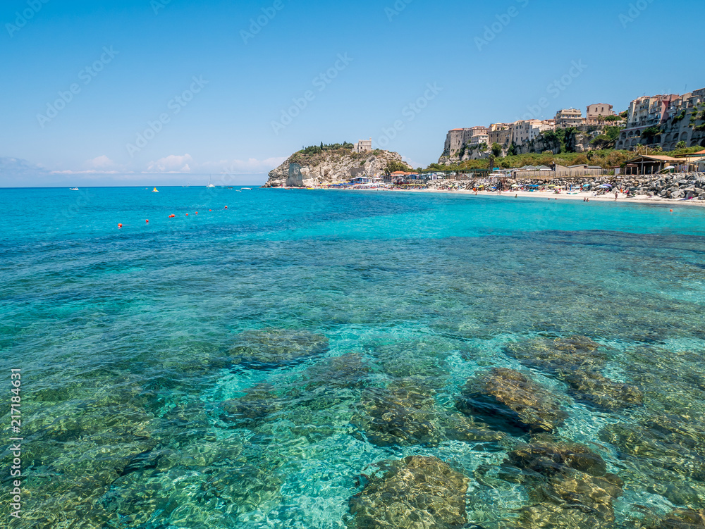 Clear water of Tropea beach in Italy.