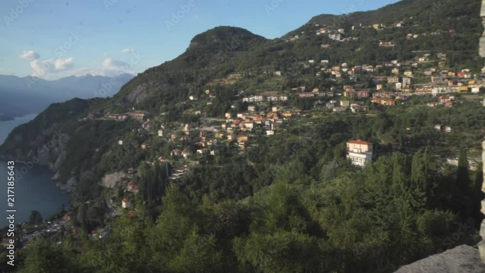 vezio castle, view over the lake and the alps mountains , inside of the old stone castle there are lot of sculpture of gosth vezio castle, view over the lake and the alps mountains , inside of the old stone castle there are lot of sculpture of gosth