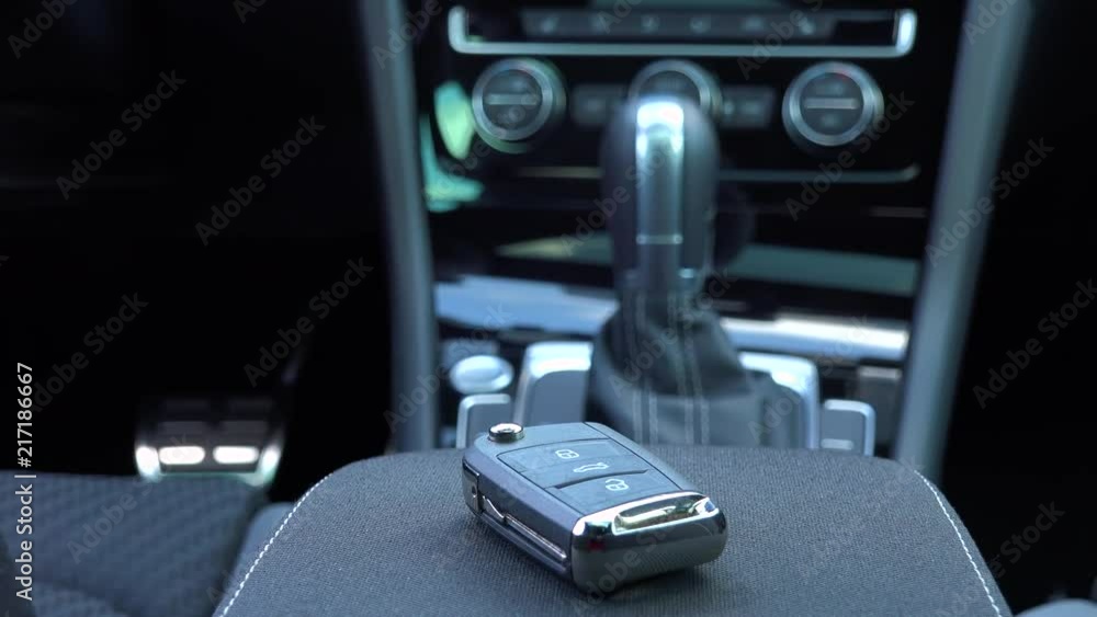 Closeup on a remote control key in a car Closeup on a remote control key in a car