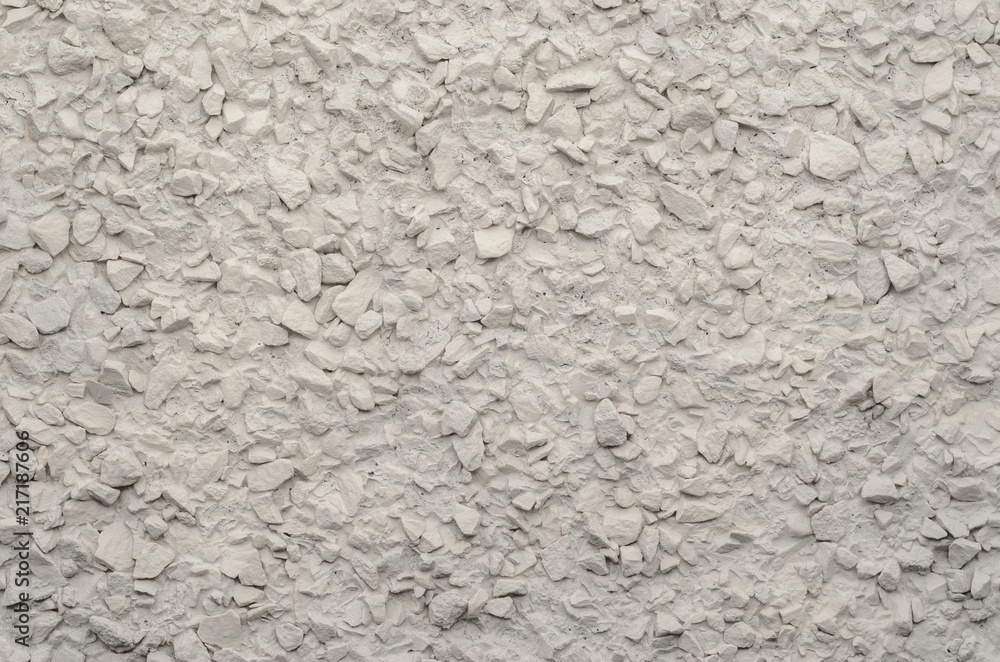 Painted Pebble Plaster Wall Texture. Fine Gravel in the Finish of the Wall