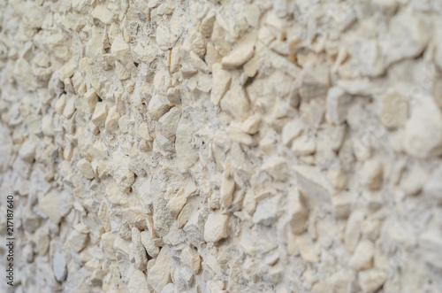Pebble Plaster Wall Background. Fine Gravel in the Finish of the Wall Abstract Blank Background