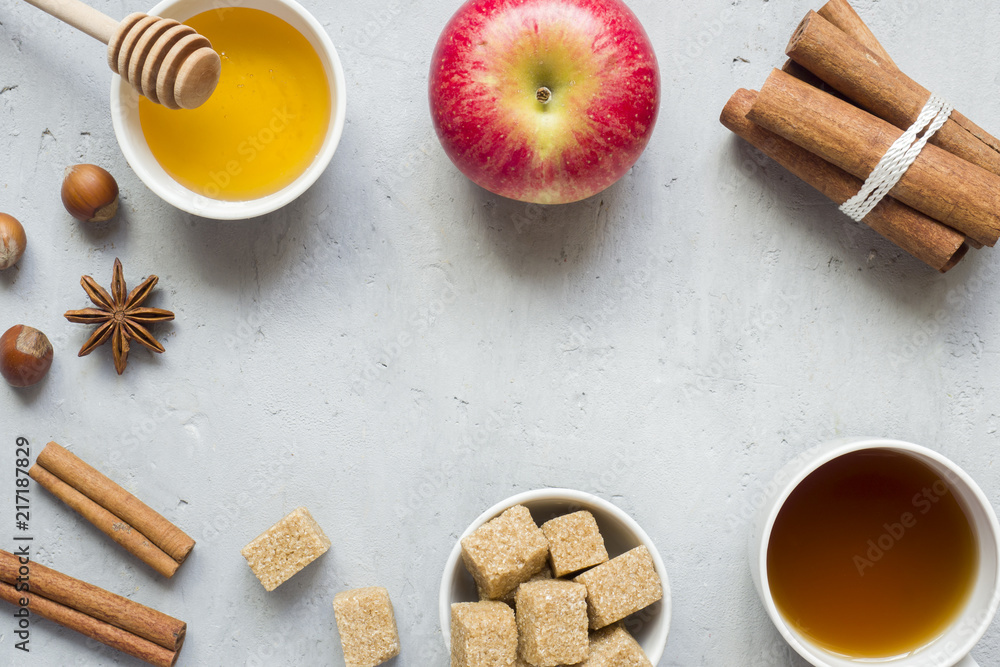 Honey and Apple, brown sugar and anise with cinnamon on a light background copy space for text. Honey and Apple, brown sugar and anise with cinnamon on a light background copy space for text.