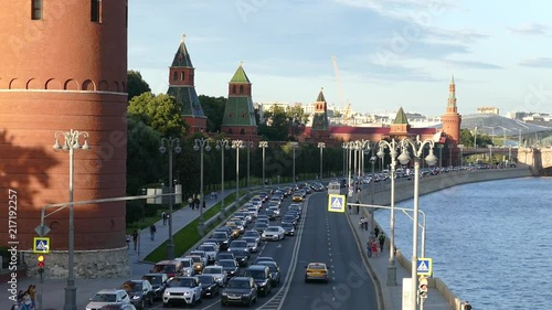 Moscow Kremlin in summer river and auto photo