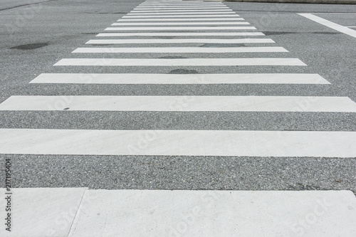 Zebra crosswalk on the road for safety when people walking cross the street, Pedestrian crossing, asphalt road, White lines and crosswalk on street background 