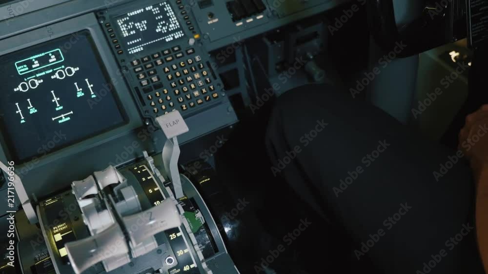 Panel of switches on an aircraft flight deck. Pilot controls the aircraft. Panel of switches on an aircraft flight deck. Pilot controls the aircraft.